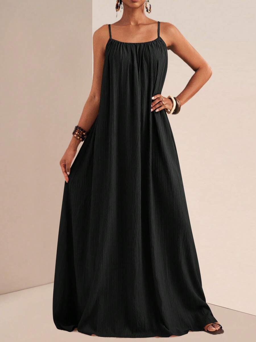 NOMÉA – Boho Flared Maxi Dress Black