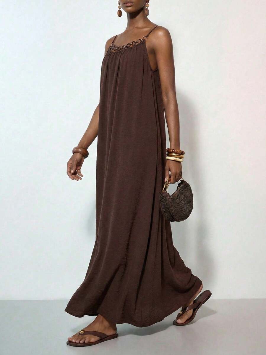 NOMÉA – Boho Flared Maxi Dress