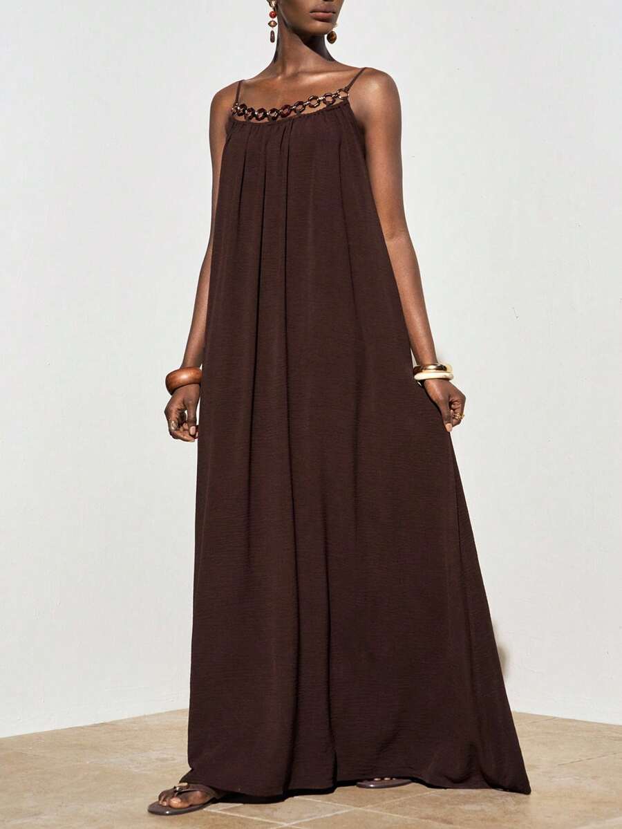 NOMÉA – Boho Flared Maxi Dress