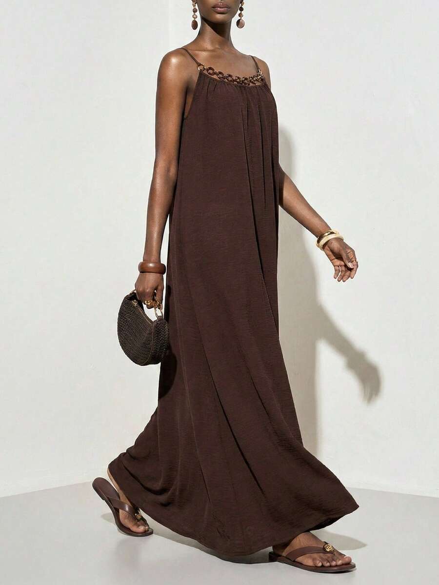 NOMÉA – Boho Flared Maxi Dress