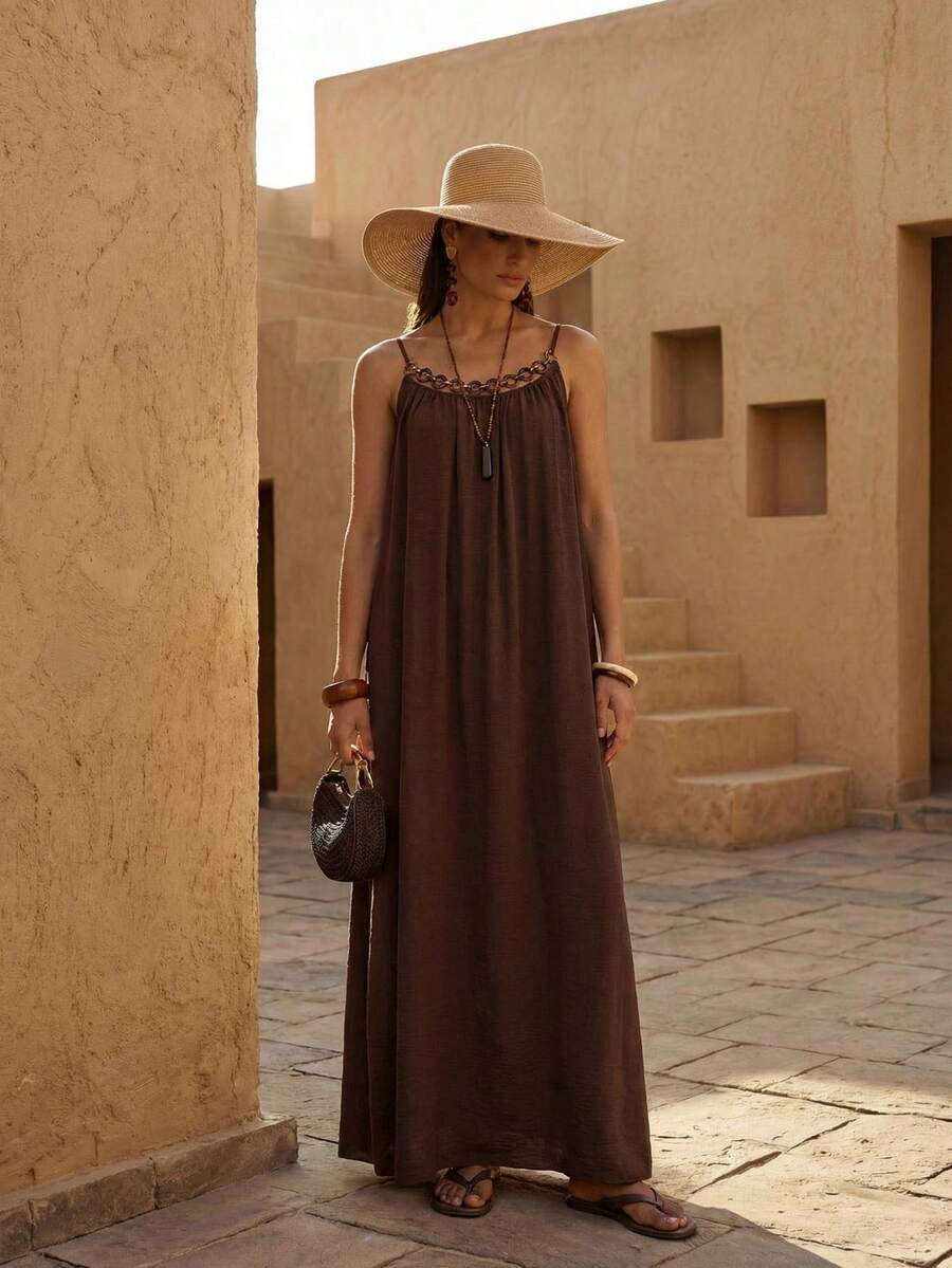 NOMÉA – Boho Flared Maxi Dress