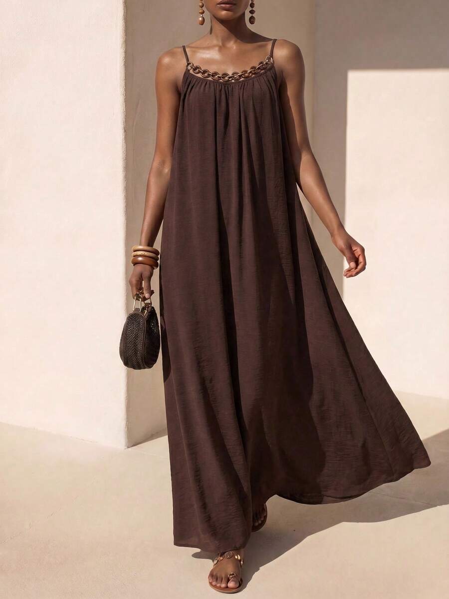 NOMÉA – Boho Flared Maxi Dress