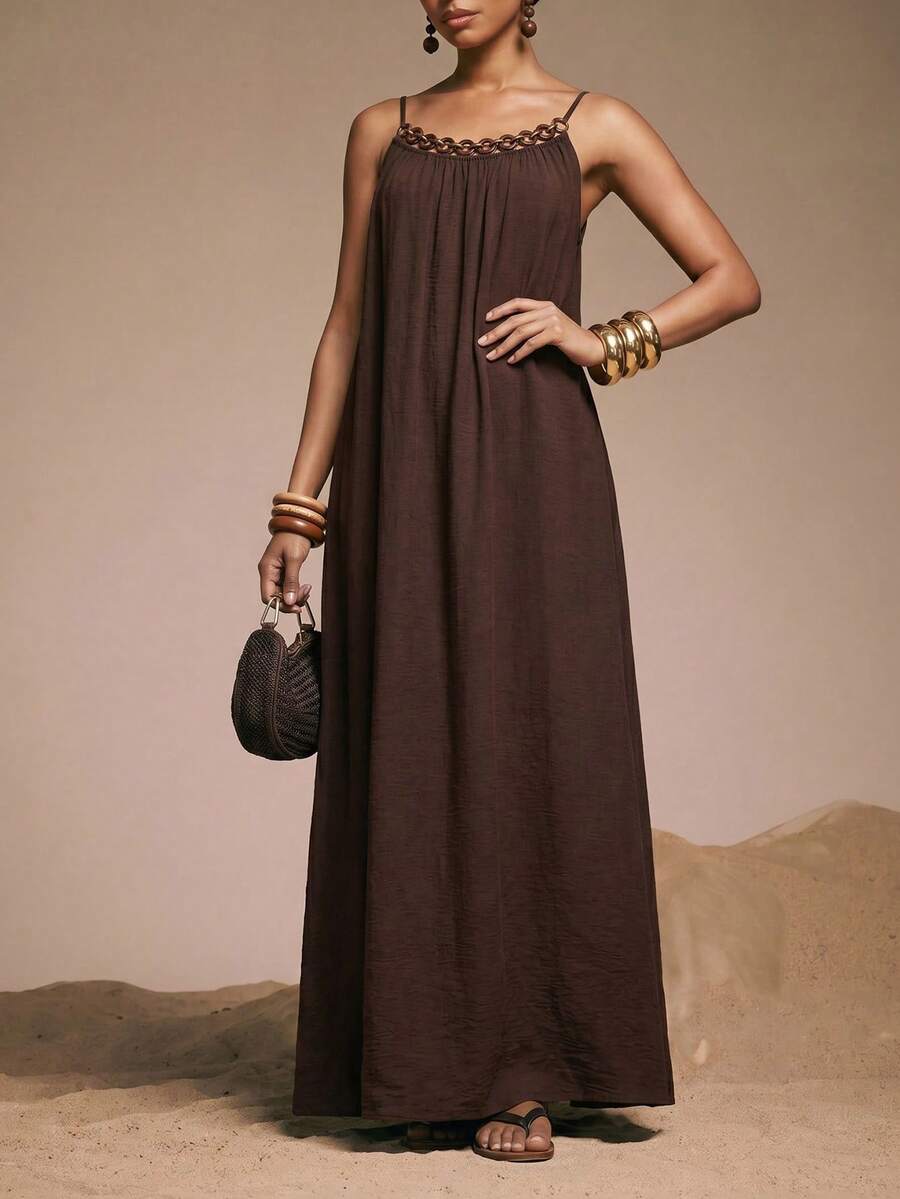 NOMÉA – Boho Flared Maxi Dress